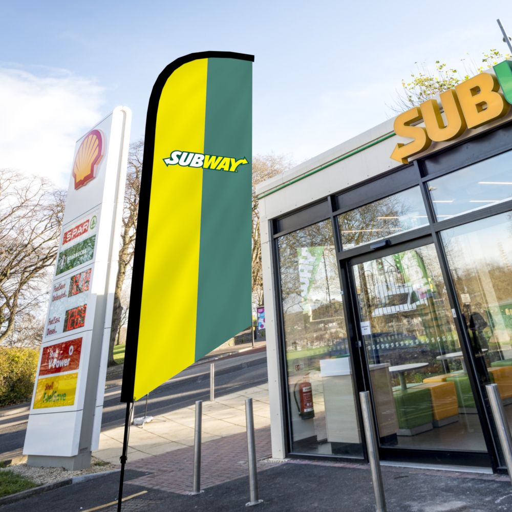 Angled flag with Subway branding outside store